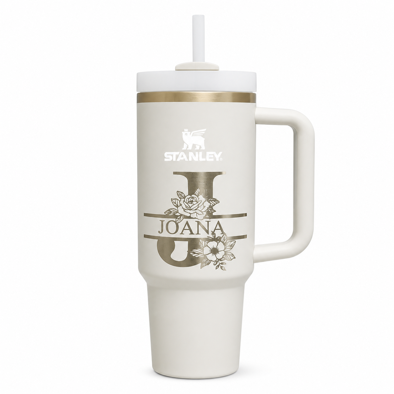 Cream handled tumbler engraved with a floral J monogram and the name Joana