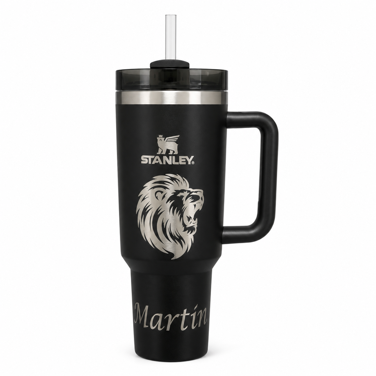 Black handled tumbler engraved with a lion and the name Martín
